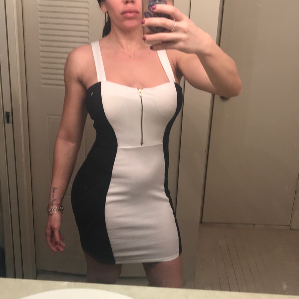 Black and white form fitting mini dress
